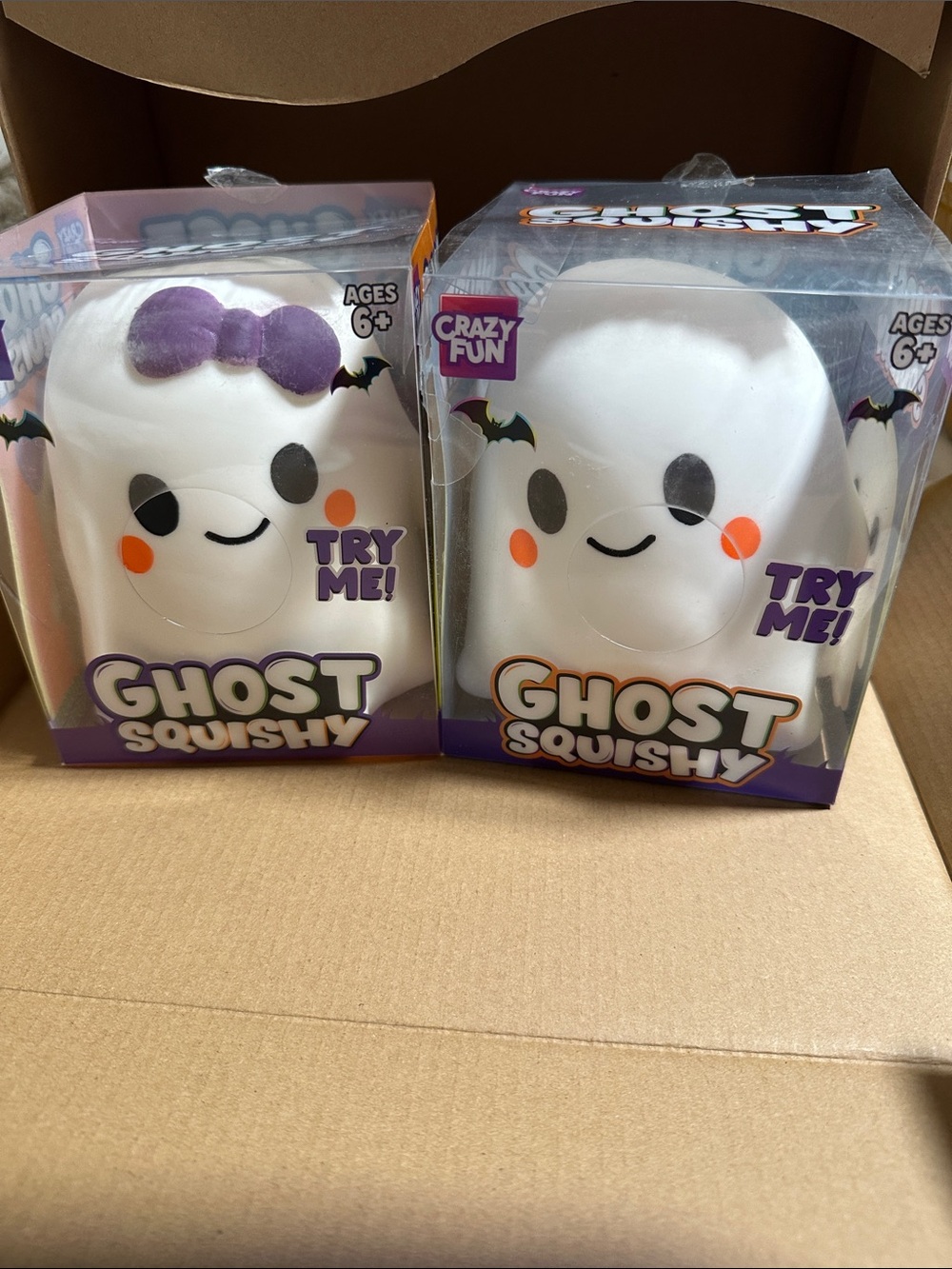Squeeze Ghost Squishy Toy White with Purple Bow and Orange Cheeks